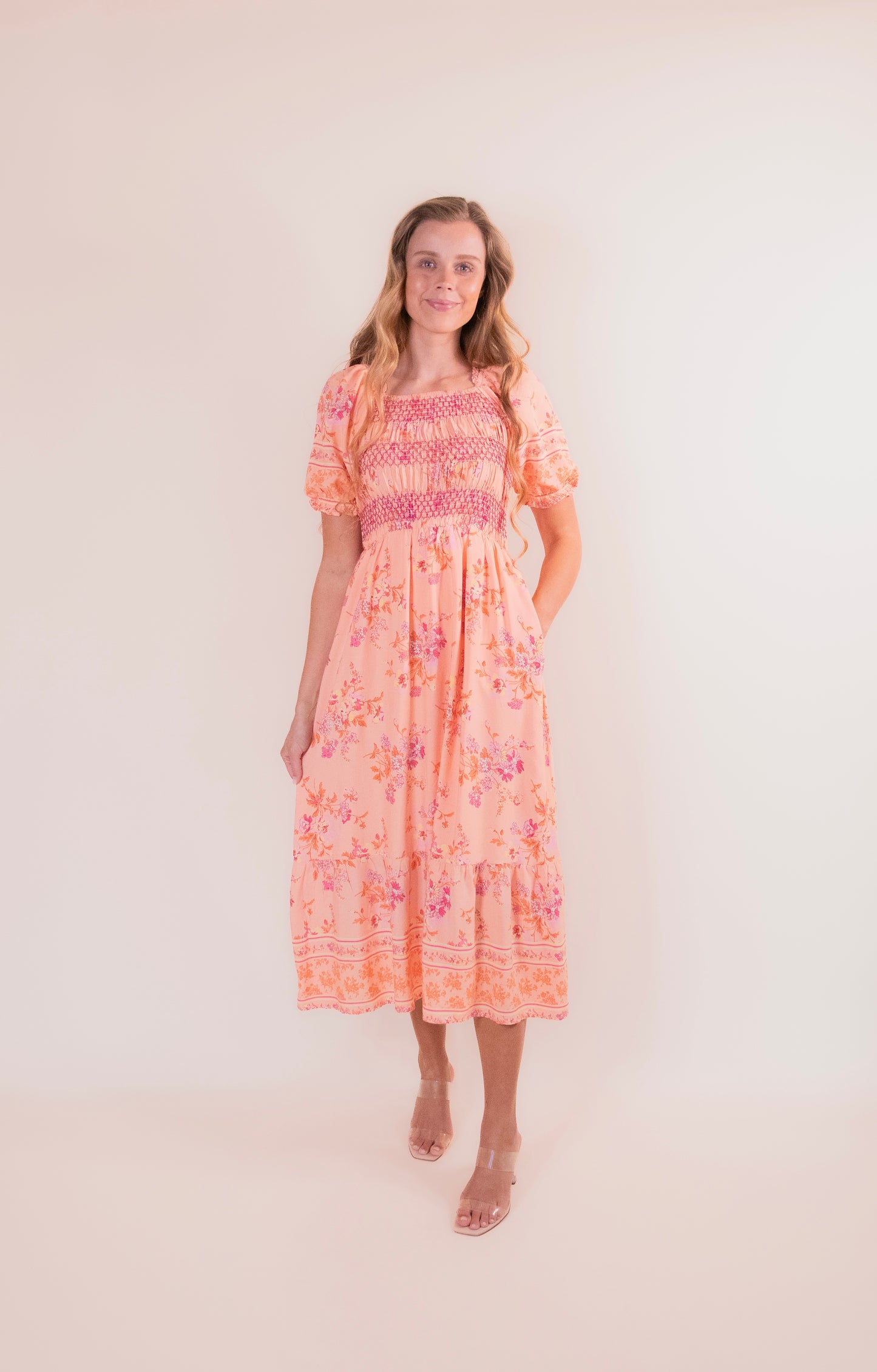 The Eva Smocked Dress in Sunset Floral