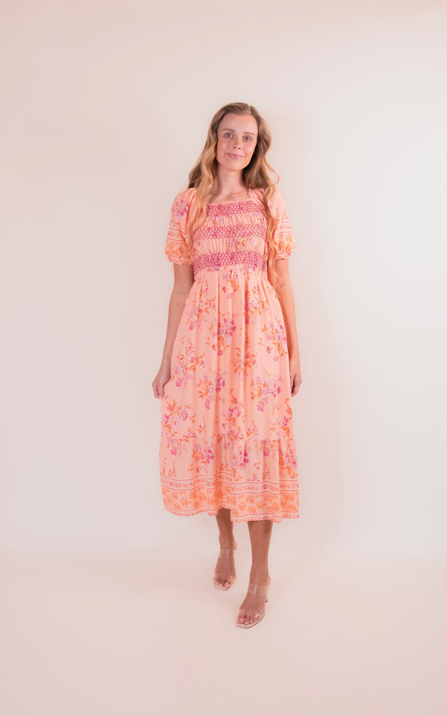 The Eva Smocked Dress in Sunset Floral
