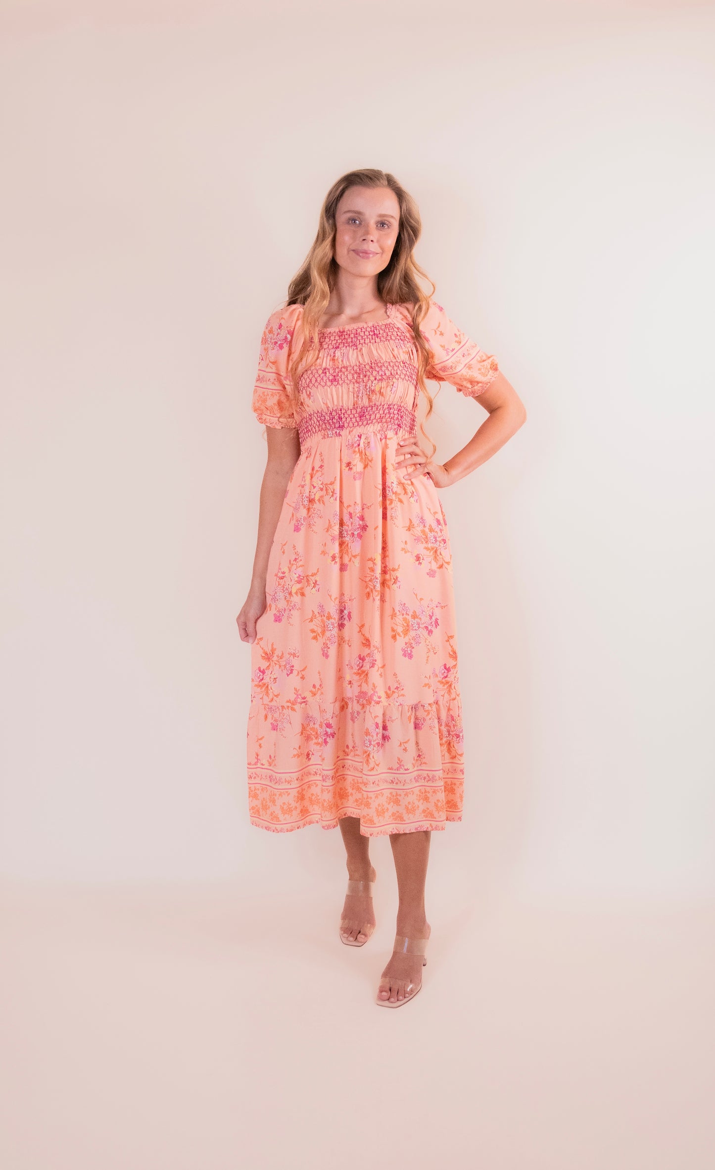 The Eva Smocked Dress in Sunset Floral