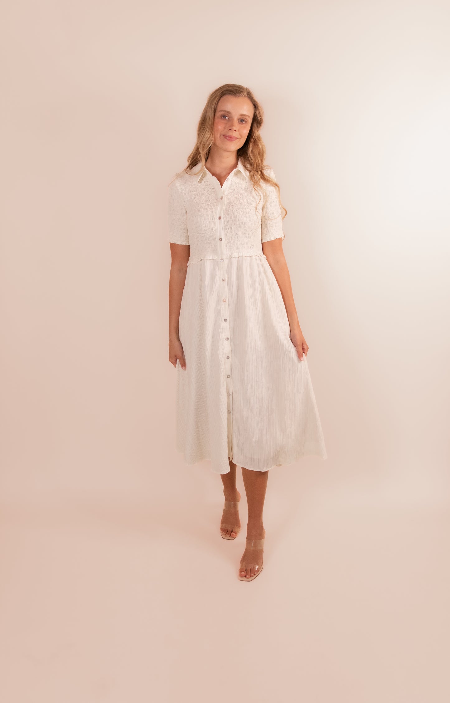 The Emma Smocked Midi Dress in Buttercream