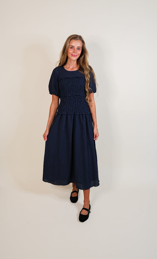 The Josie Smocked Dress in Navy Gingham