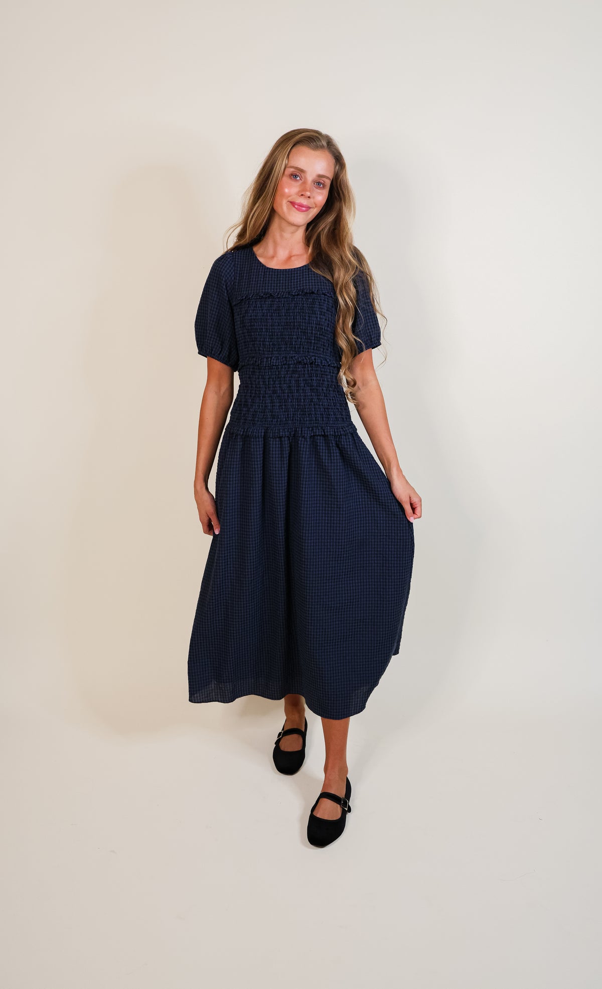 The Josie Smocked Dress in Navy Gingham