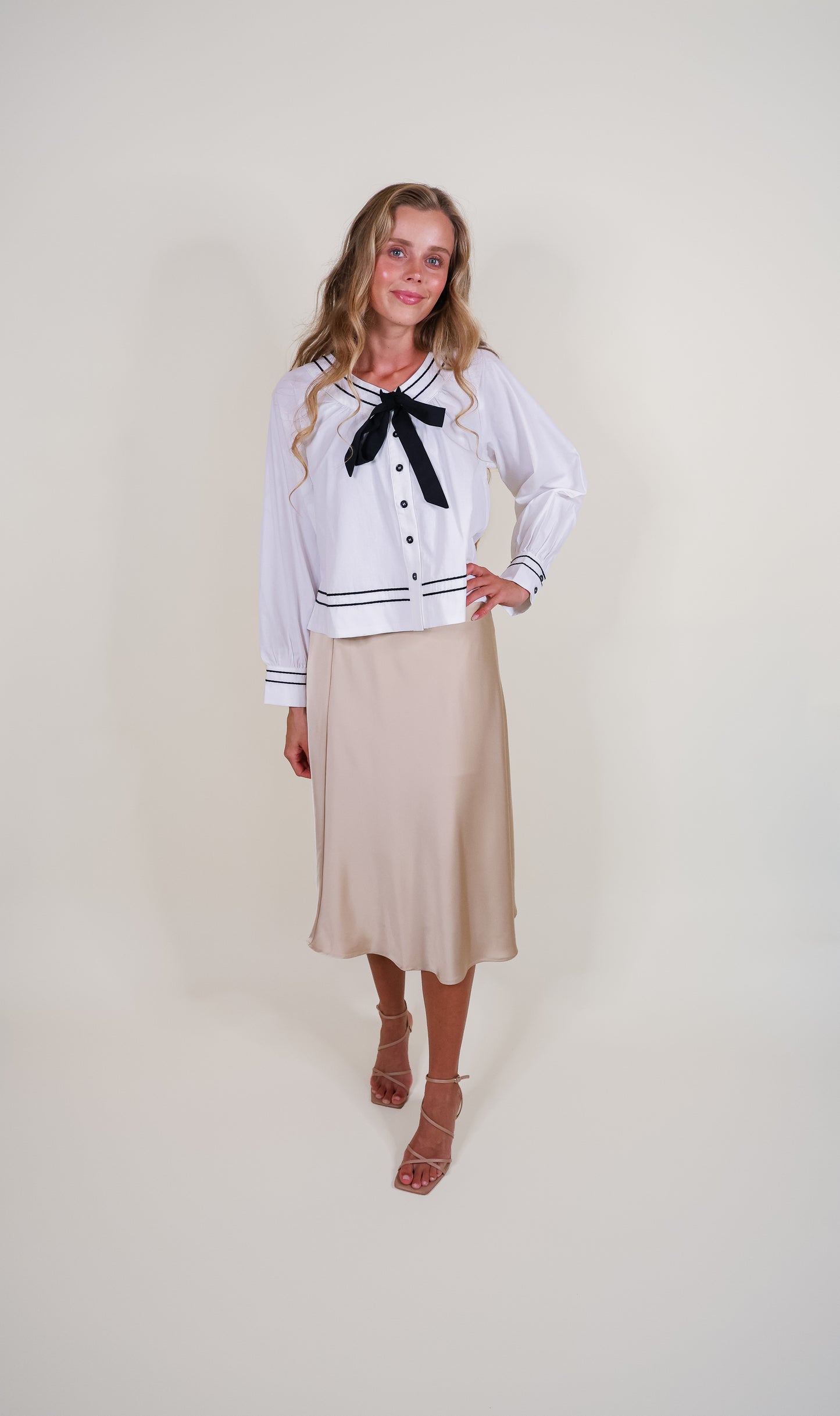 The Sienna Bow Babydoll Blouse in Ivory & Black