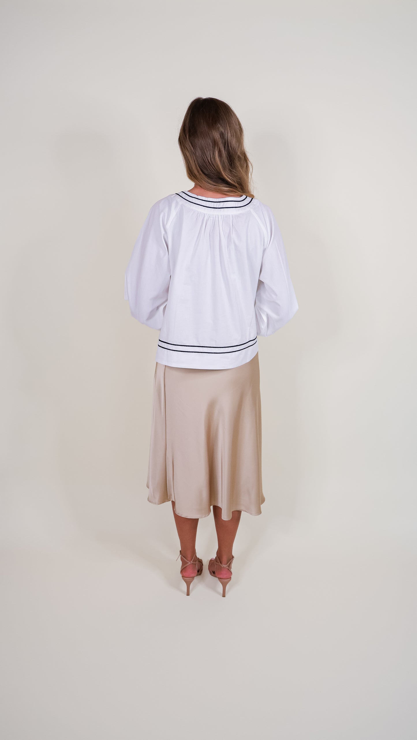 The Sienna Bow Babydoll Blouse in Ivory & Black