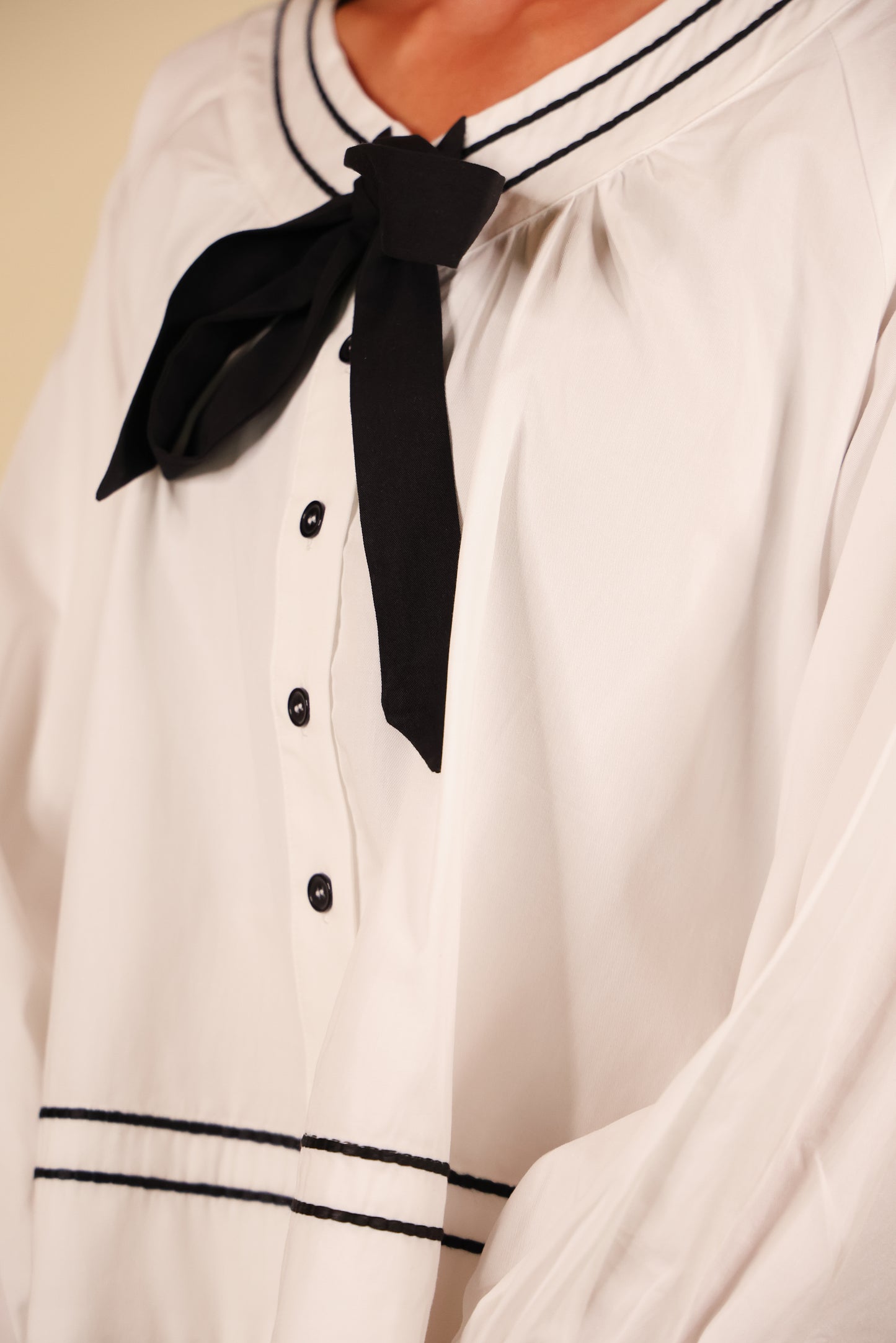 The Sienna Bow Babydoll Blouse in Ivory & Black