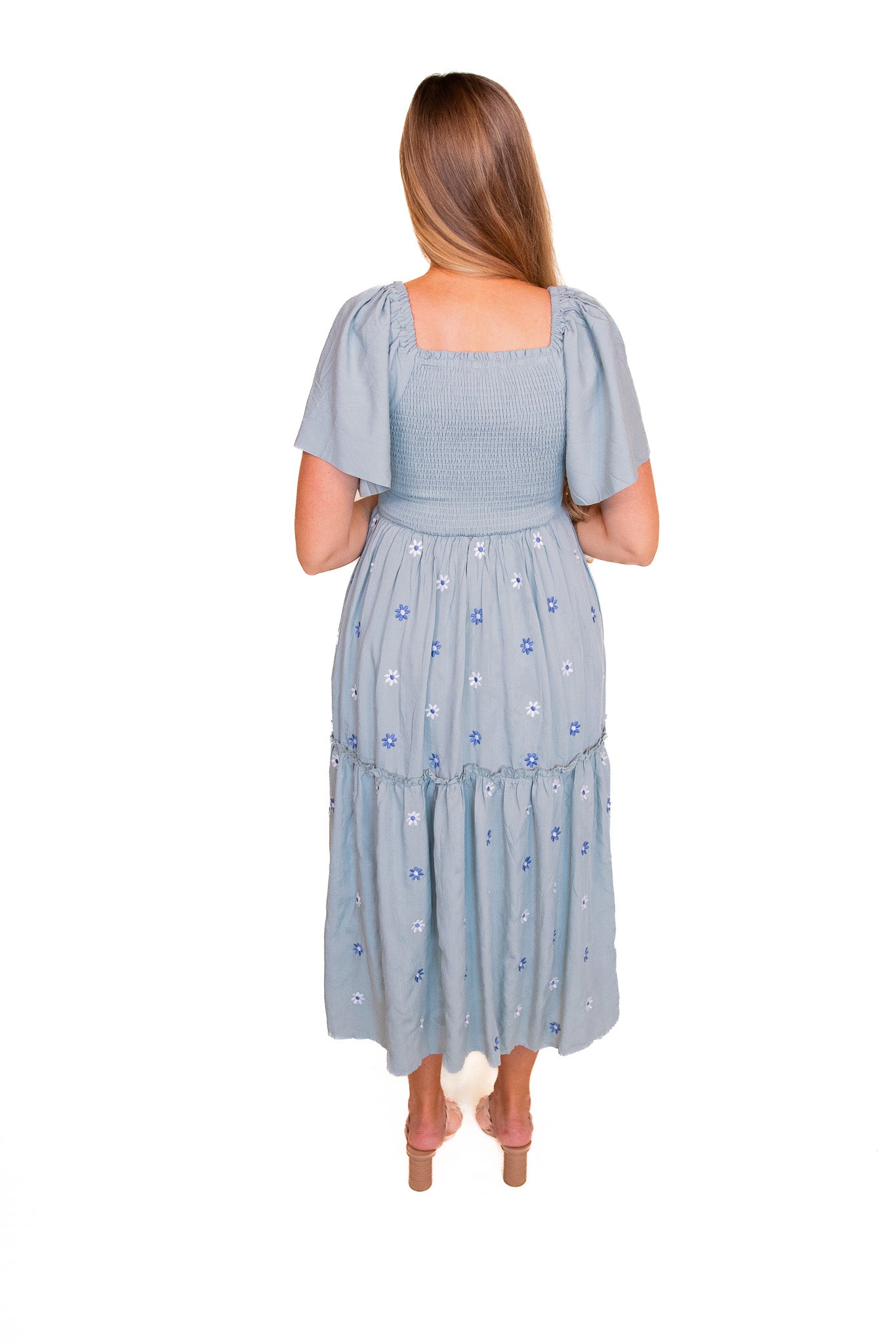 The Maya Smocked Embroidered Floral Dress in Dusty Blue