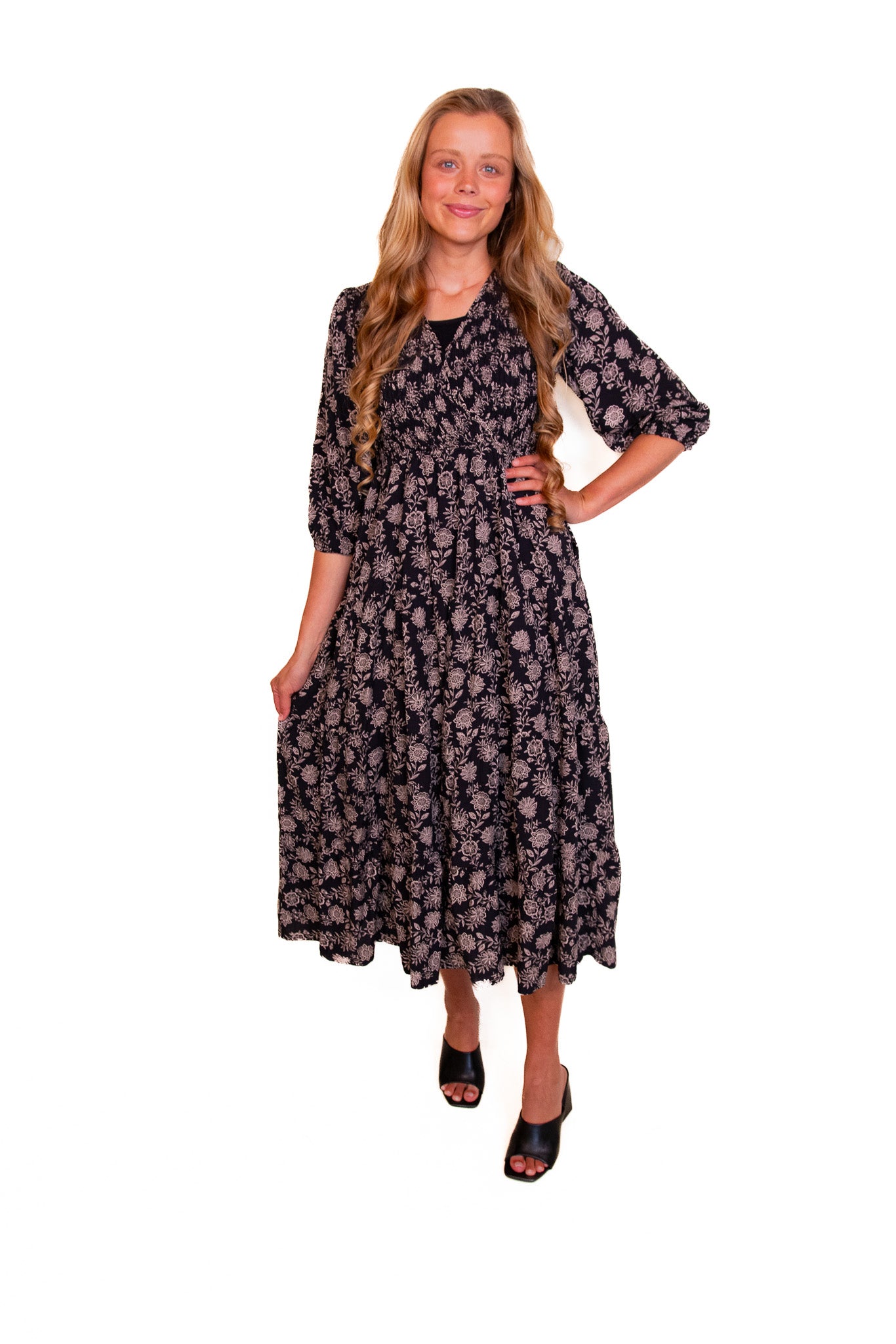 The Kelli Smocked Wrap Midi in Black Fall Floral