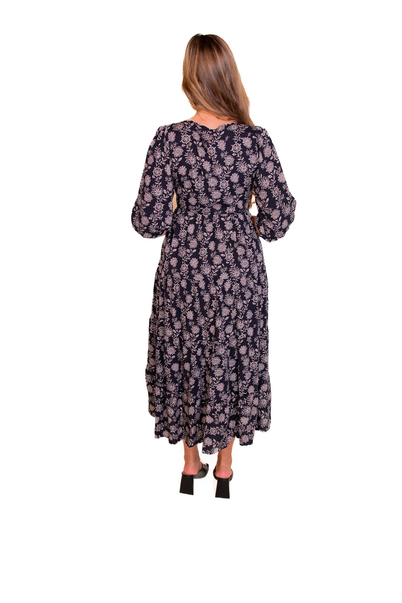 The Kelli Smocked Wrap Midi in Black Fall Floral