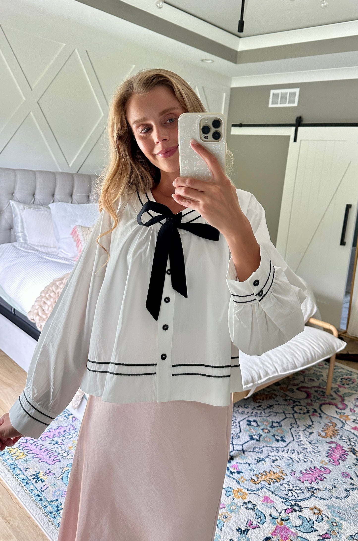 The Sienna Bow Babydoll Blouse in Ivory & Black