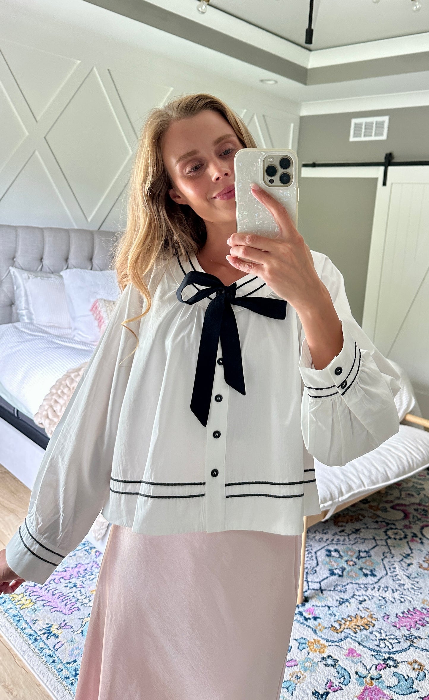 The Sienna Bow Babydoll Blouse in Ivory & Black