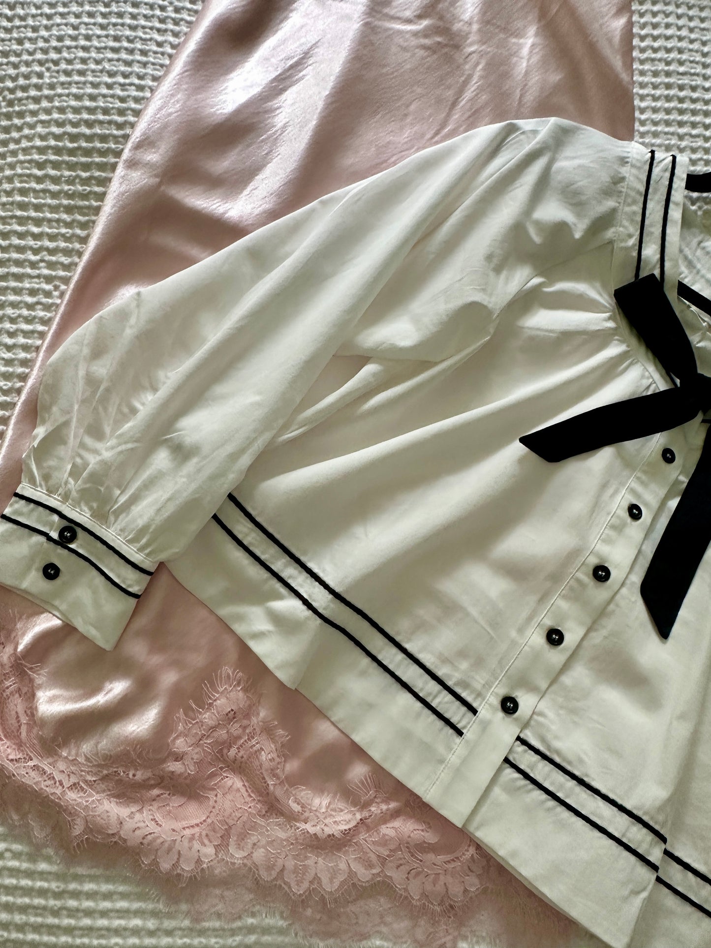 The Sienna Bow Babydoll Blouse in Ivory & Black