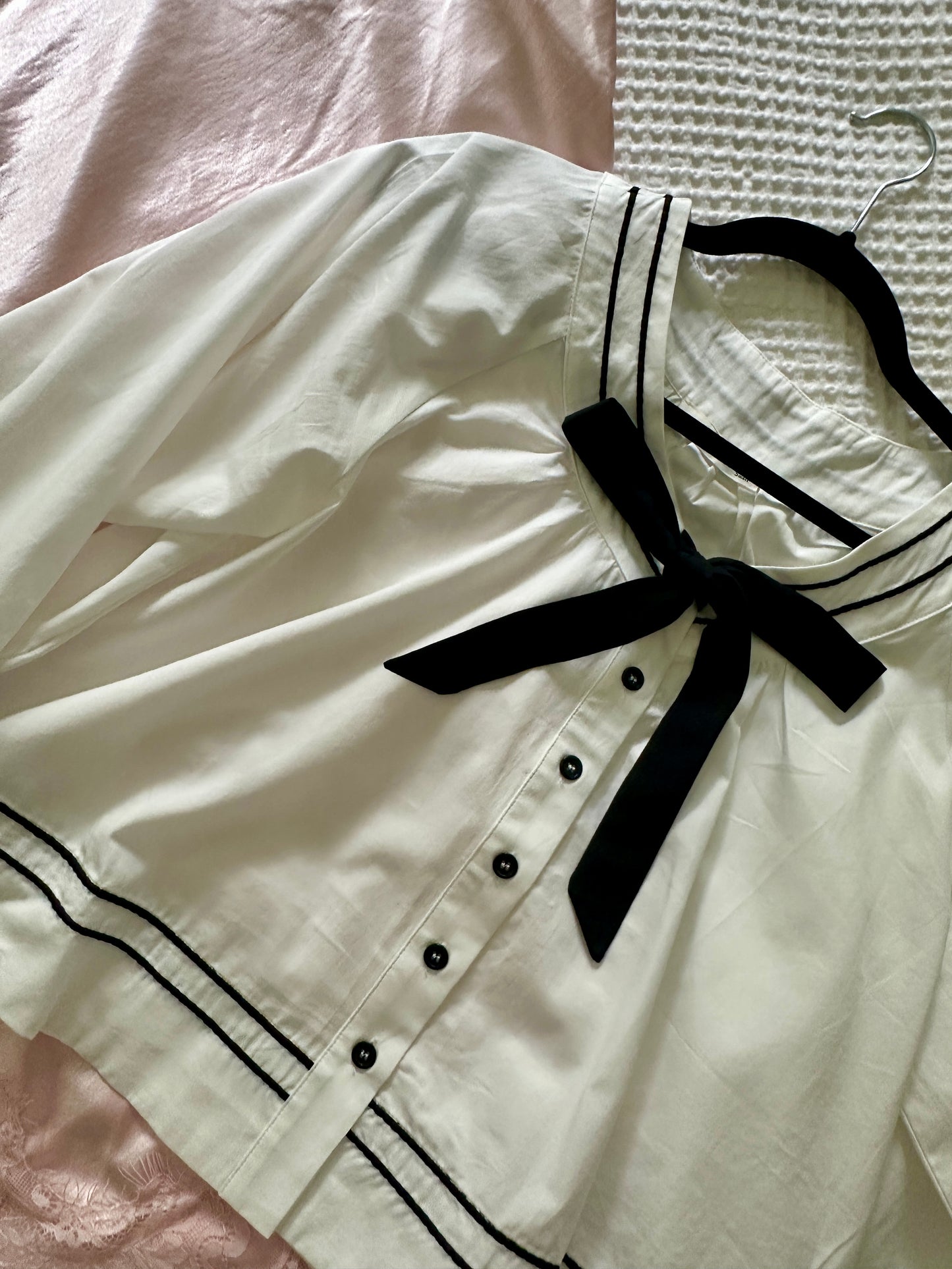 The Sienna Bow Babydoll Blouse in Ivory & Black