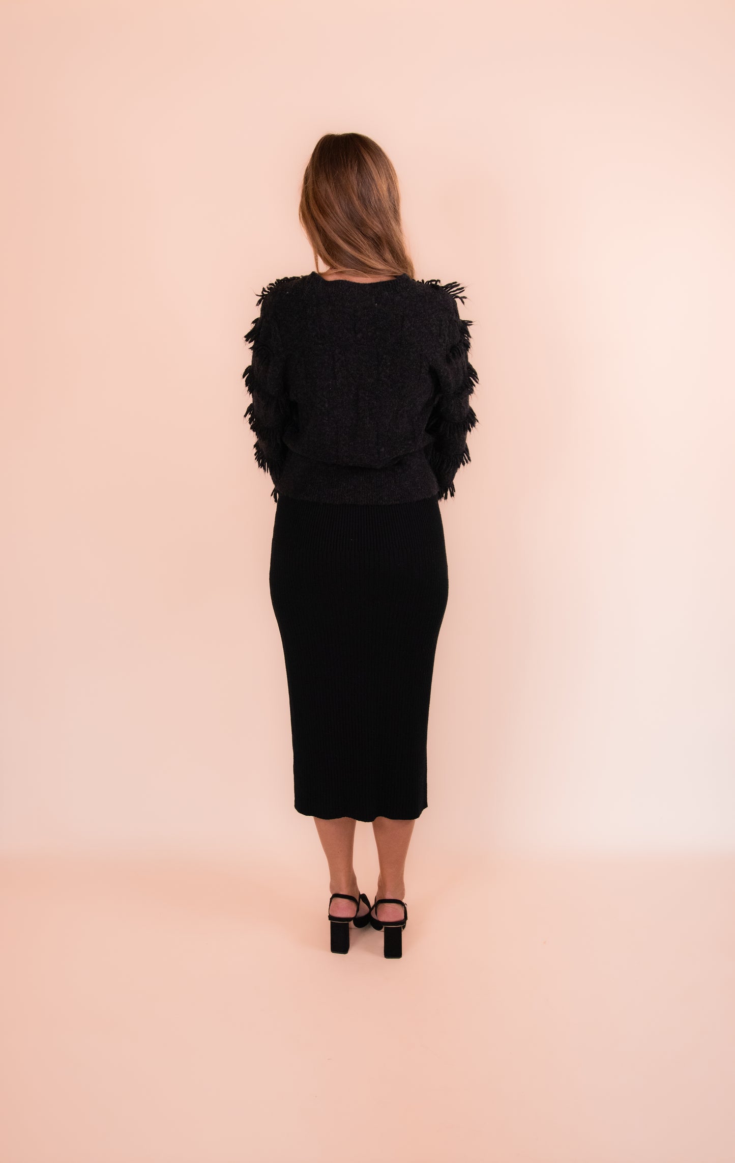 The Stevie Ribbed Sweater Skirt in Black