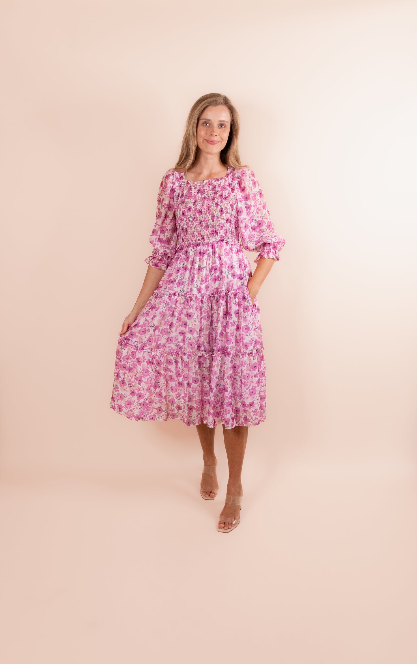 The Lexi Smocked Midi in Magenta Floral