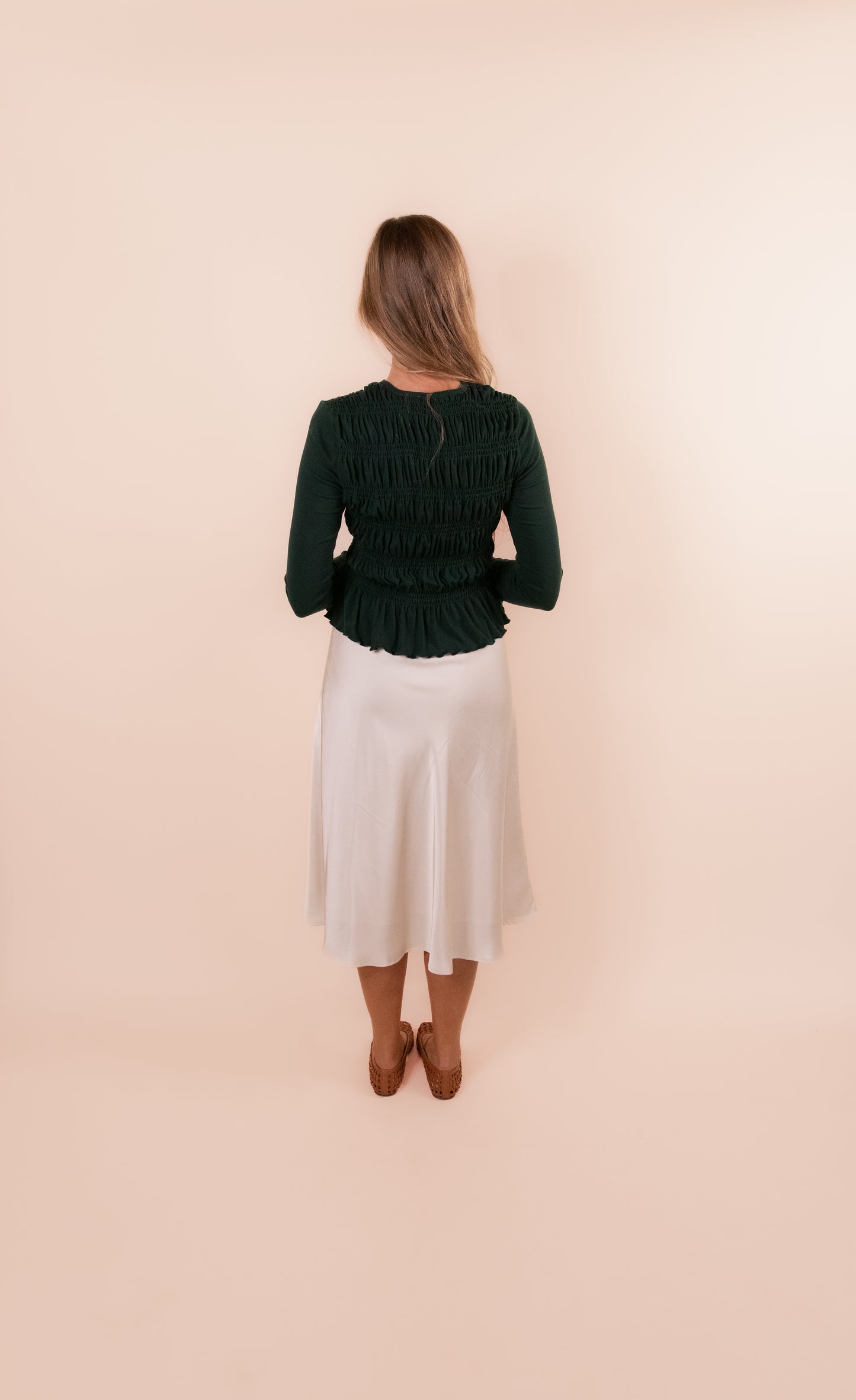 The Karly Smocked Long Sleeve Top in Emerald Green