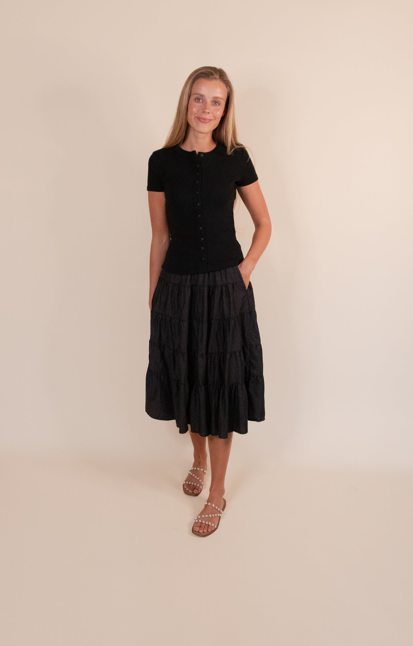 The Kenna Tiered Midi Skirt in Washed Black Denim