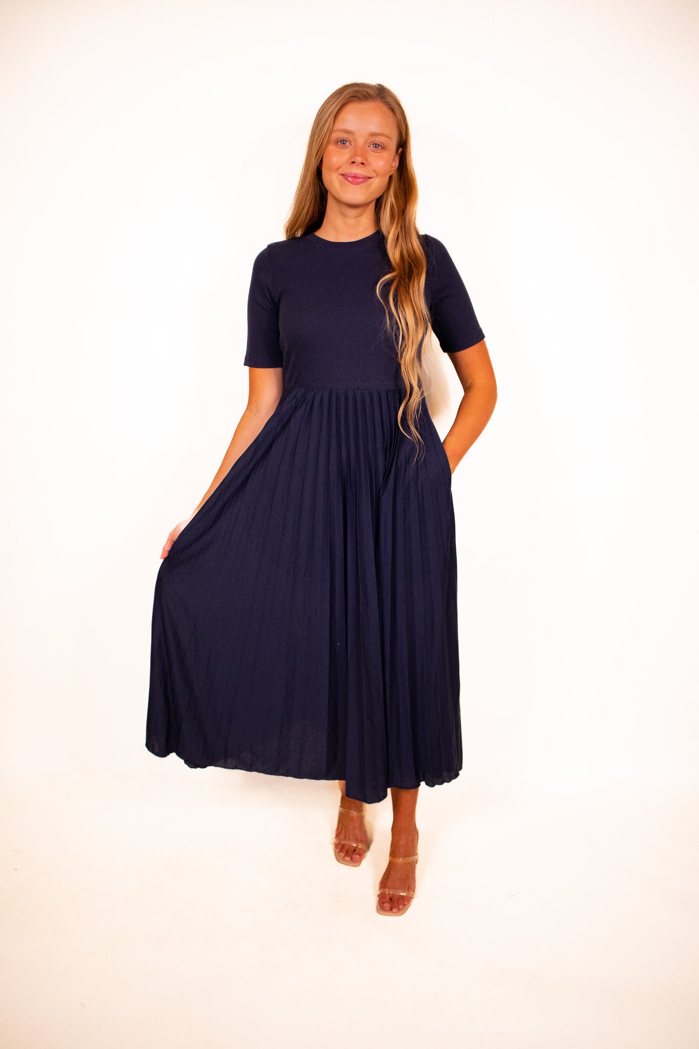 The Lucy Pleated Dress in Navy