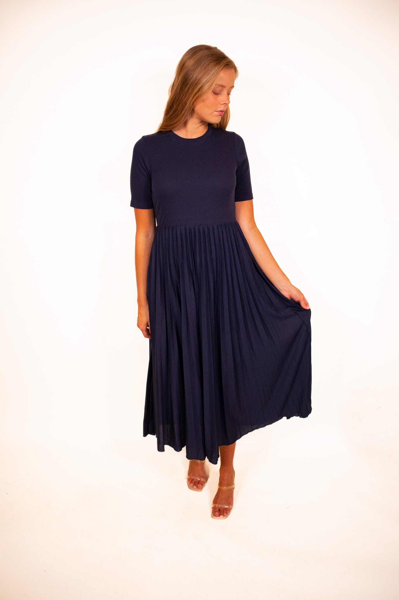 The Lucy Pleated Dress in Navy