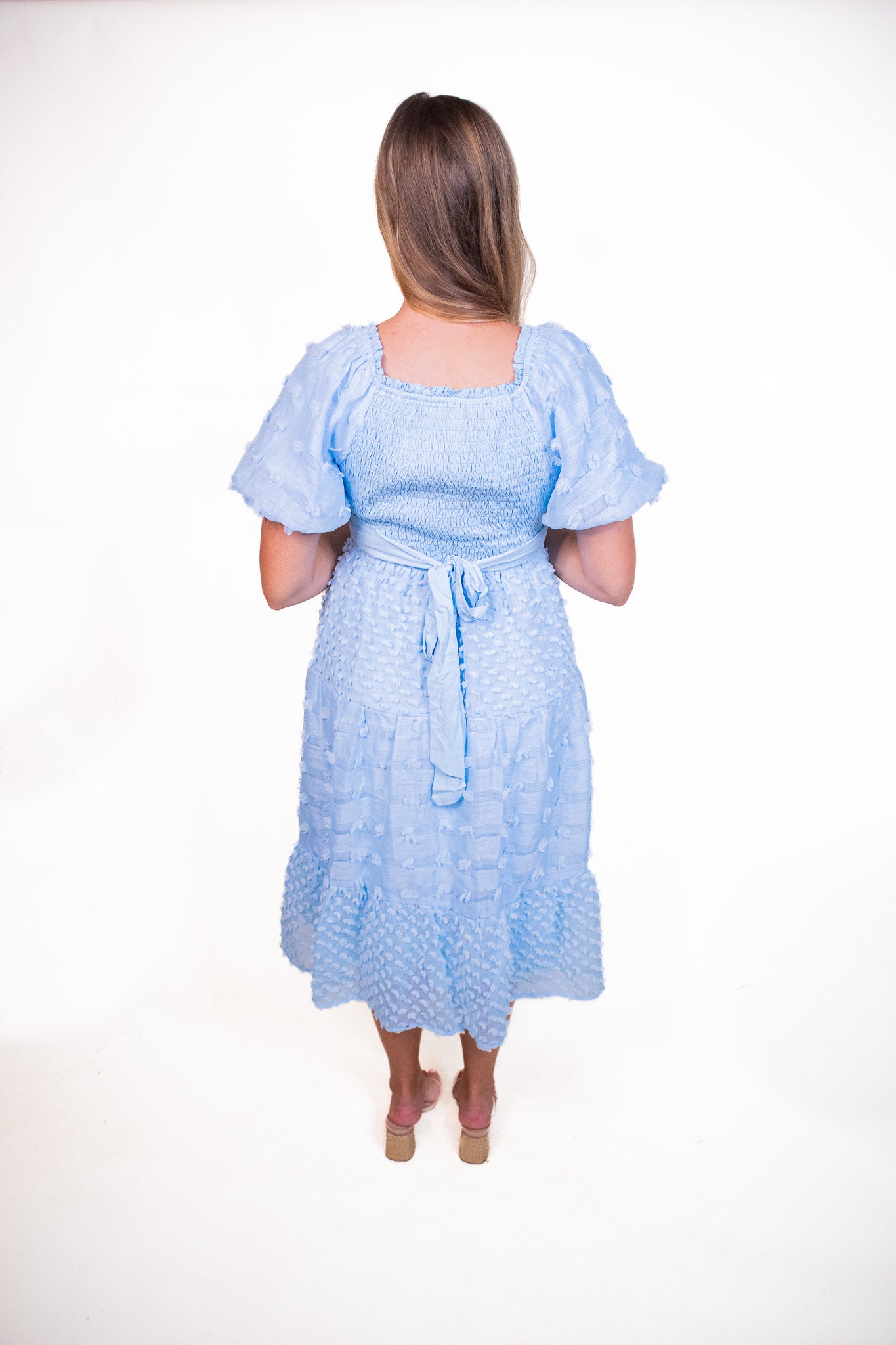 The Leah Smocked Pom Dress in Baby Blue