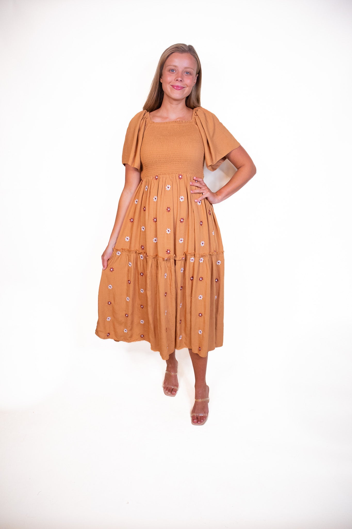 The Maya Smocked Embroidered Floral Dress in Rust