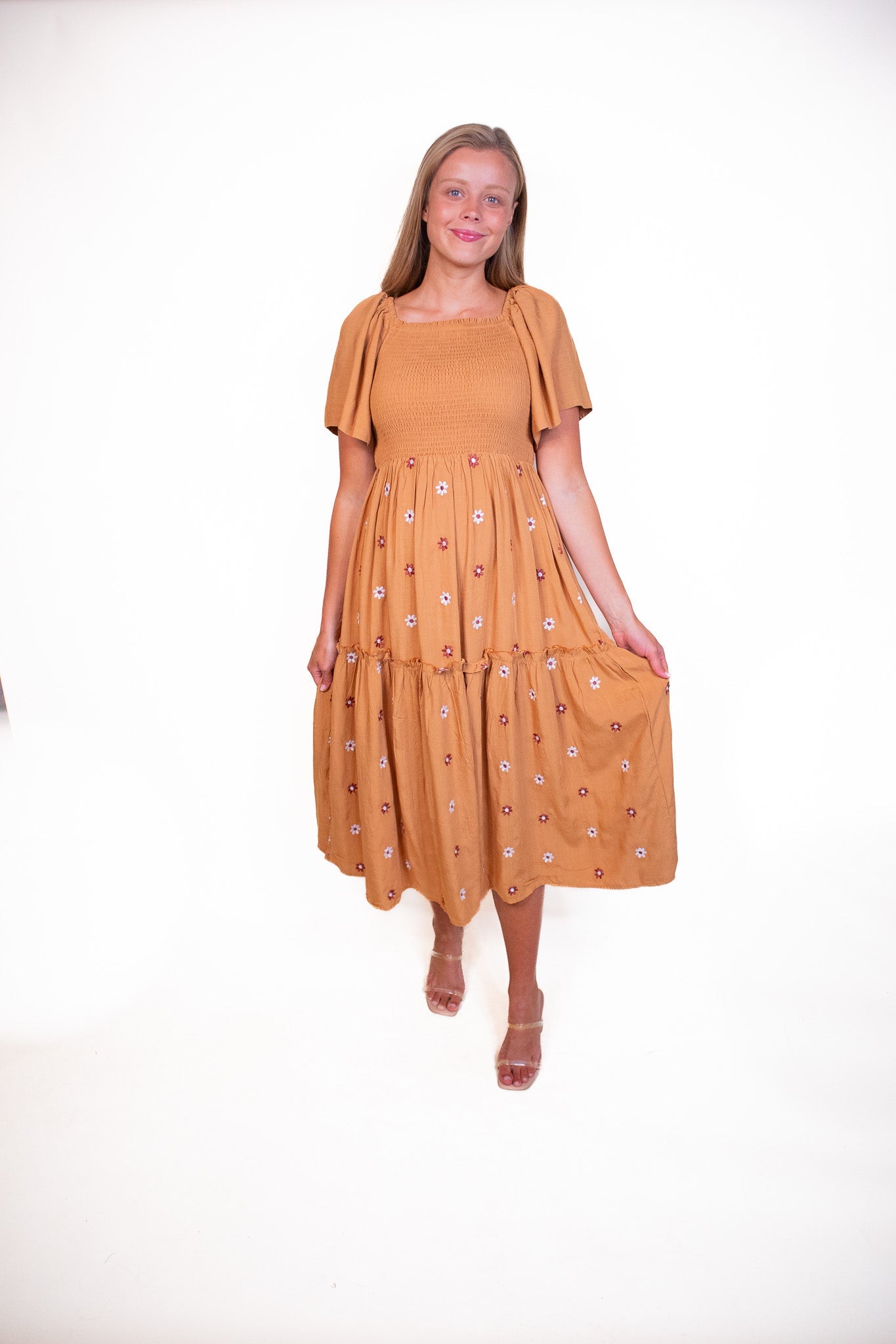 The Maya Smocked Embroidered Floral Dress in Rust