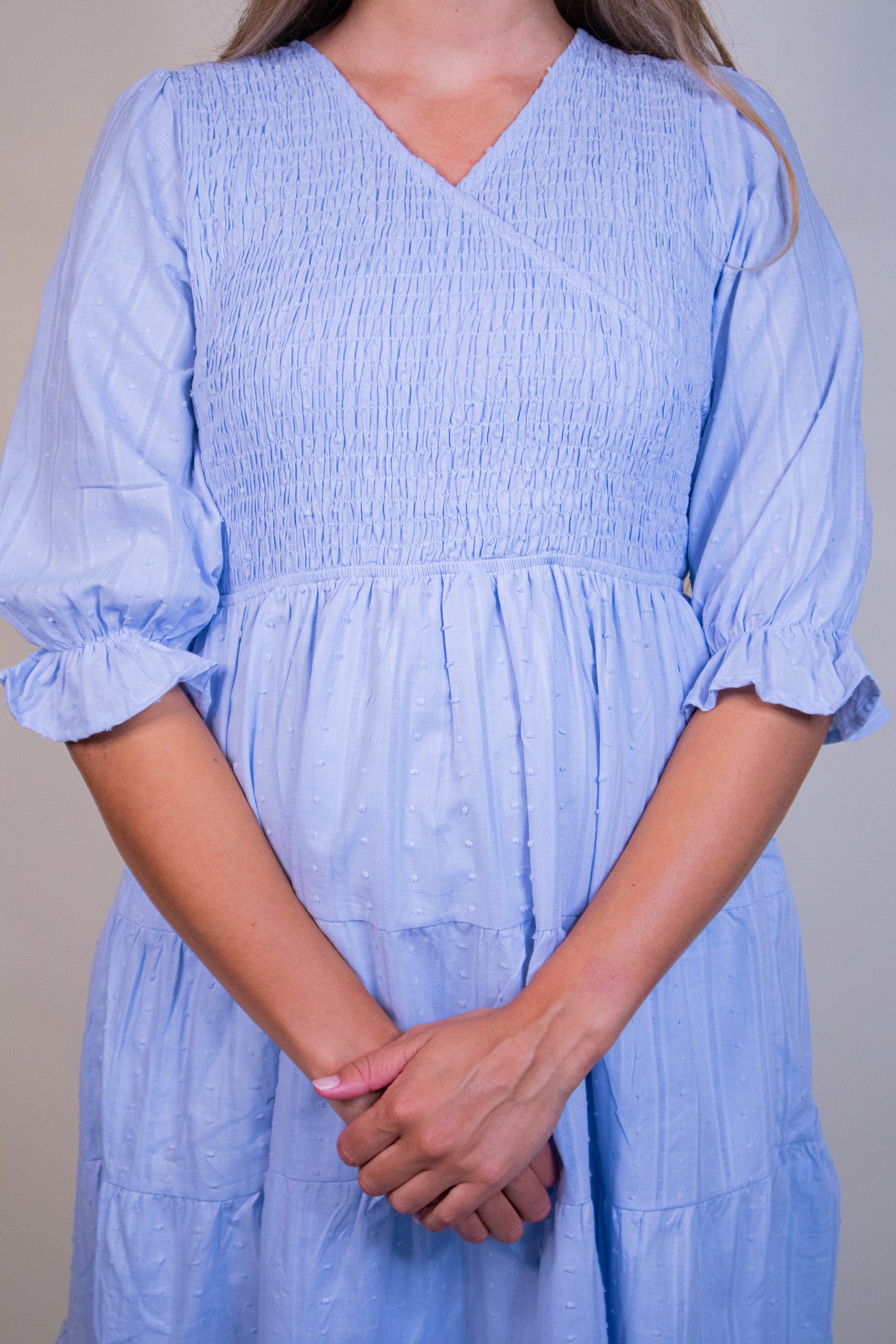 The Ellen Smocked Wrap Dress in Baby Blue