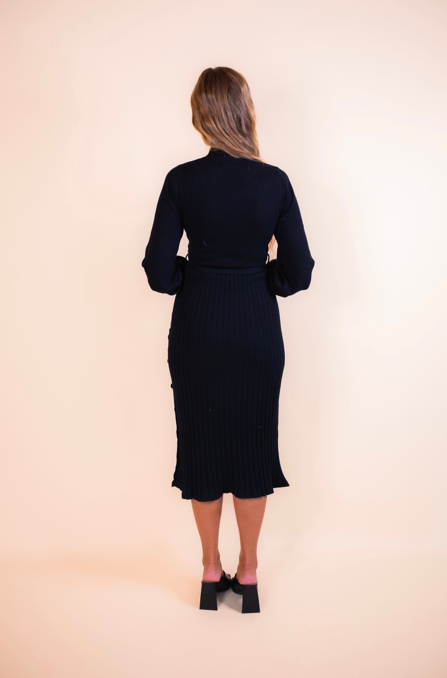 The Maren Mockneck Sweater Dress in Black