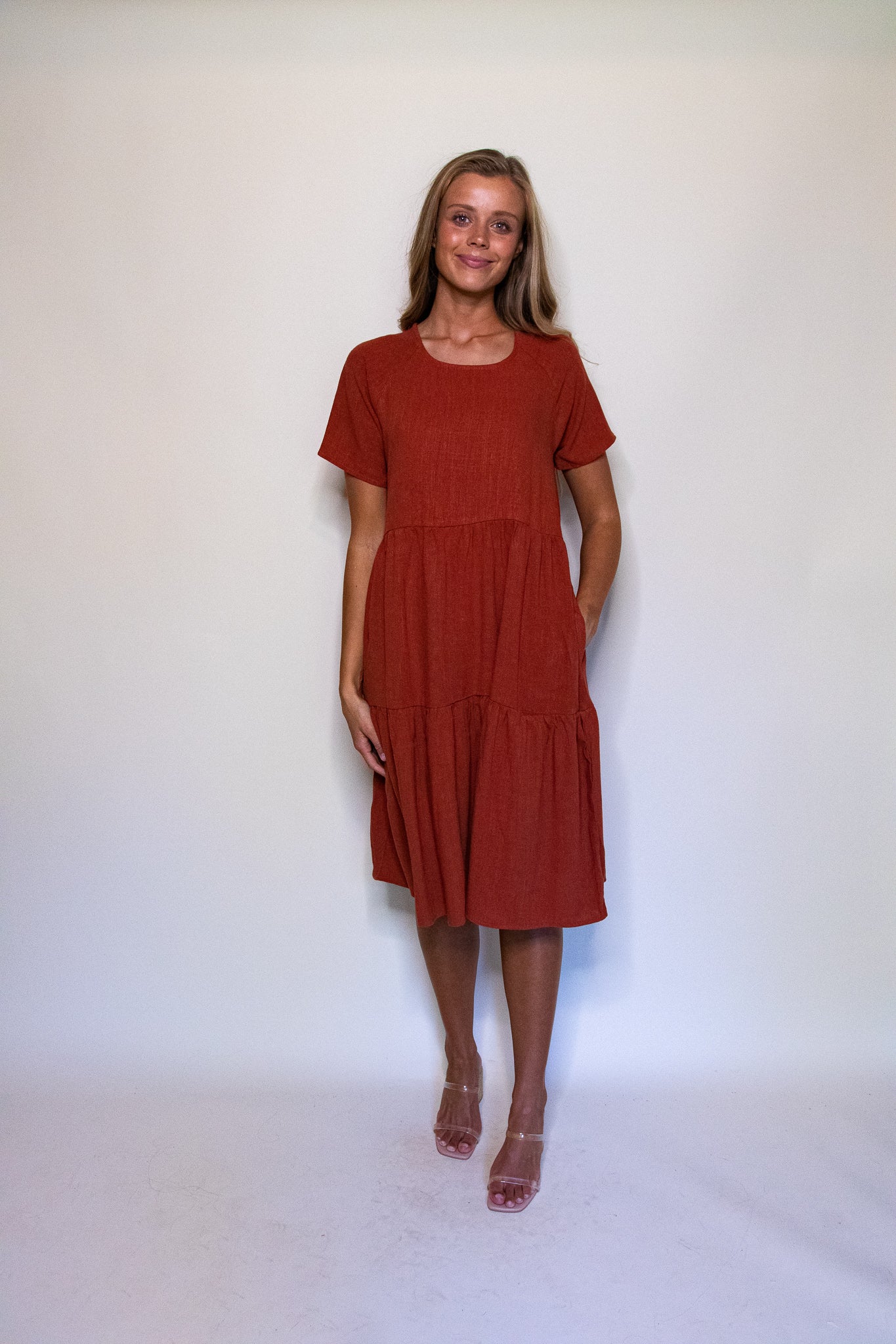 The Kelly Tiered T-Shirt Dress with Pockets in Rust