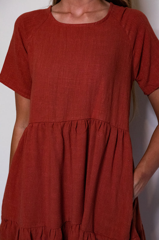 The Kelly Tiered T-Shirt Dress with Pockets in Rust