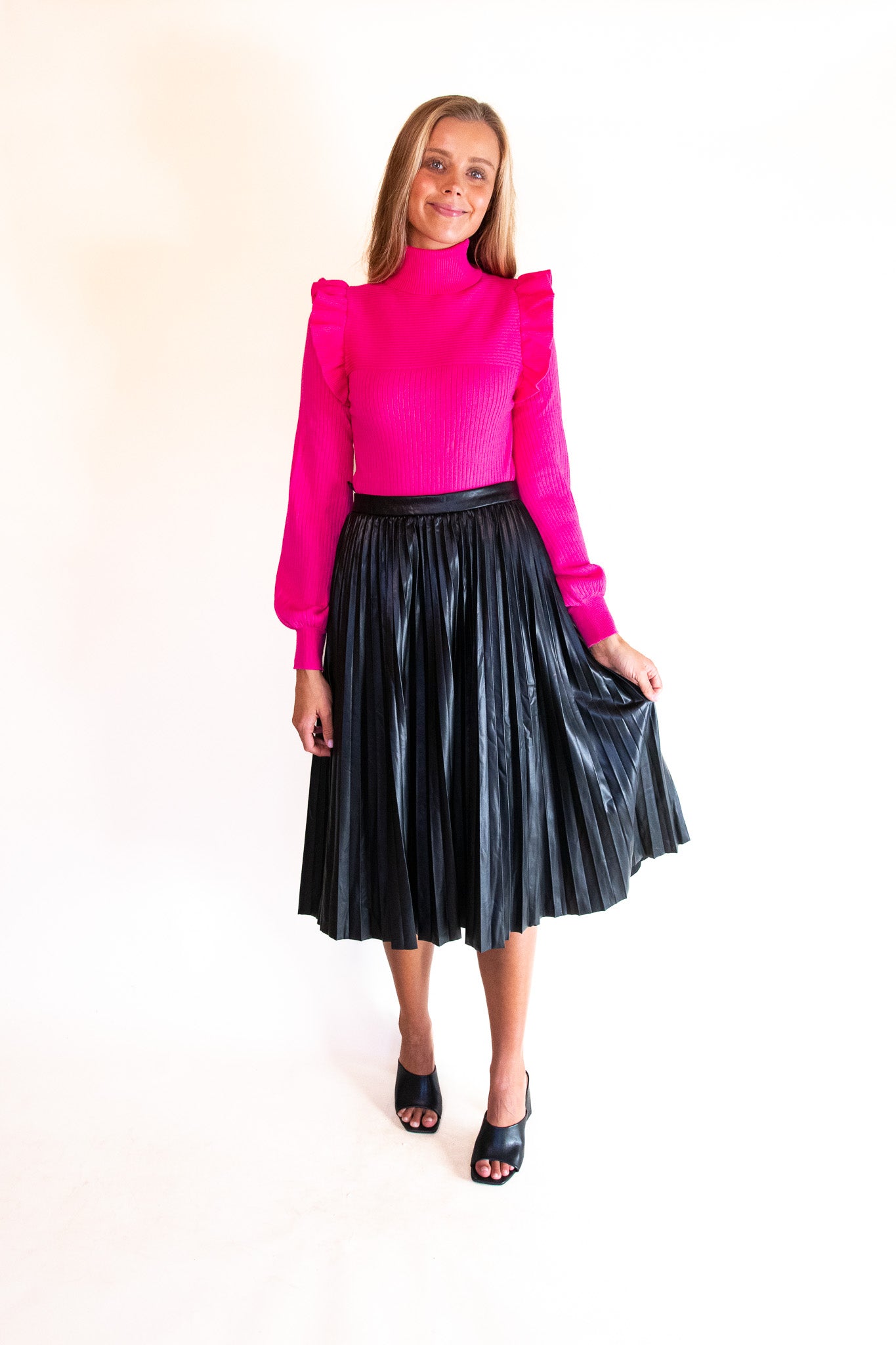 The Zoe Turtleneck Sweater in Pink